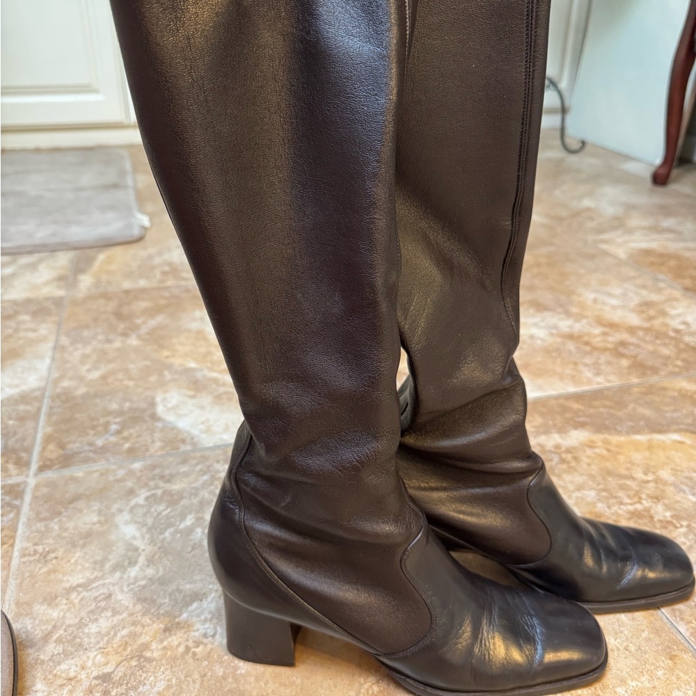 High End dark brown boots. Gently used in original box.